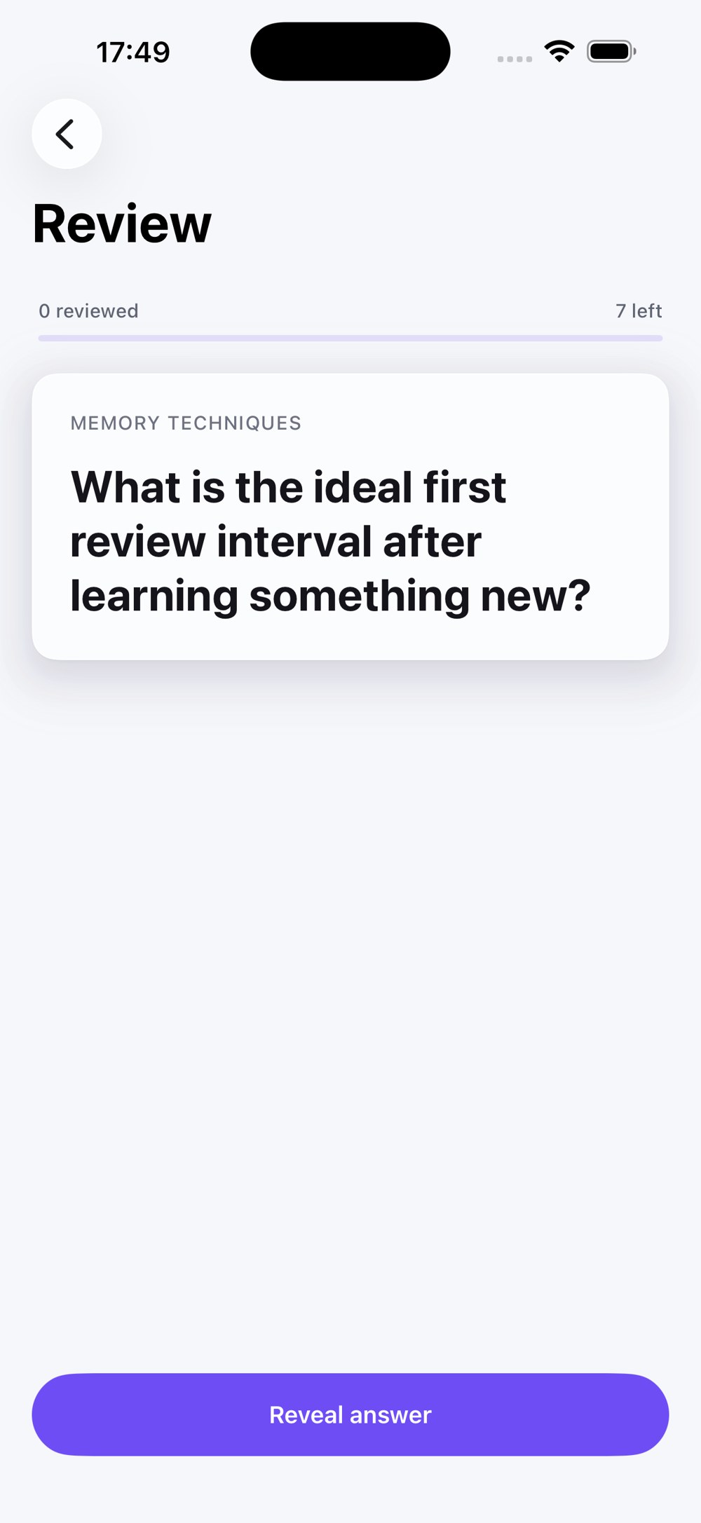 Review screen asking a question in elegant serif type, with a Reveal answer button